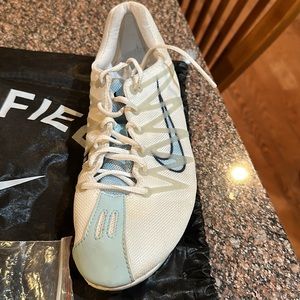 Women’s Nike Track and Field sprinter sneakers w/ original bag and cleats size 7